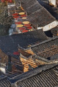 High angle view of food drying on rooftops