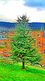 View of buildings against cloudy sky