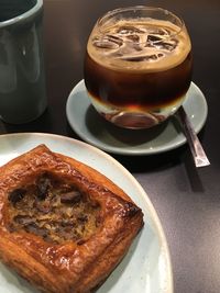 High angle view of coffee served on table