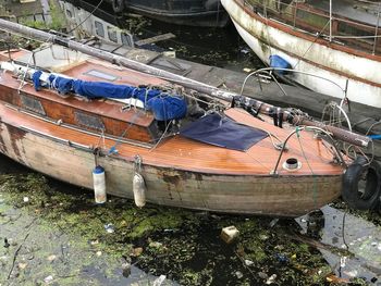 High angle view of boats moored at harbor