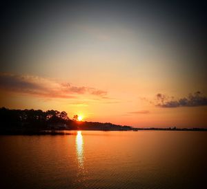 Scenic view of sunset over river