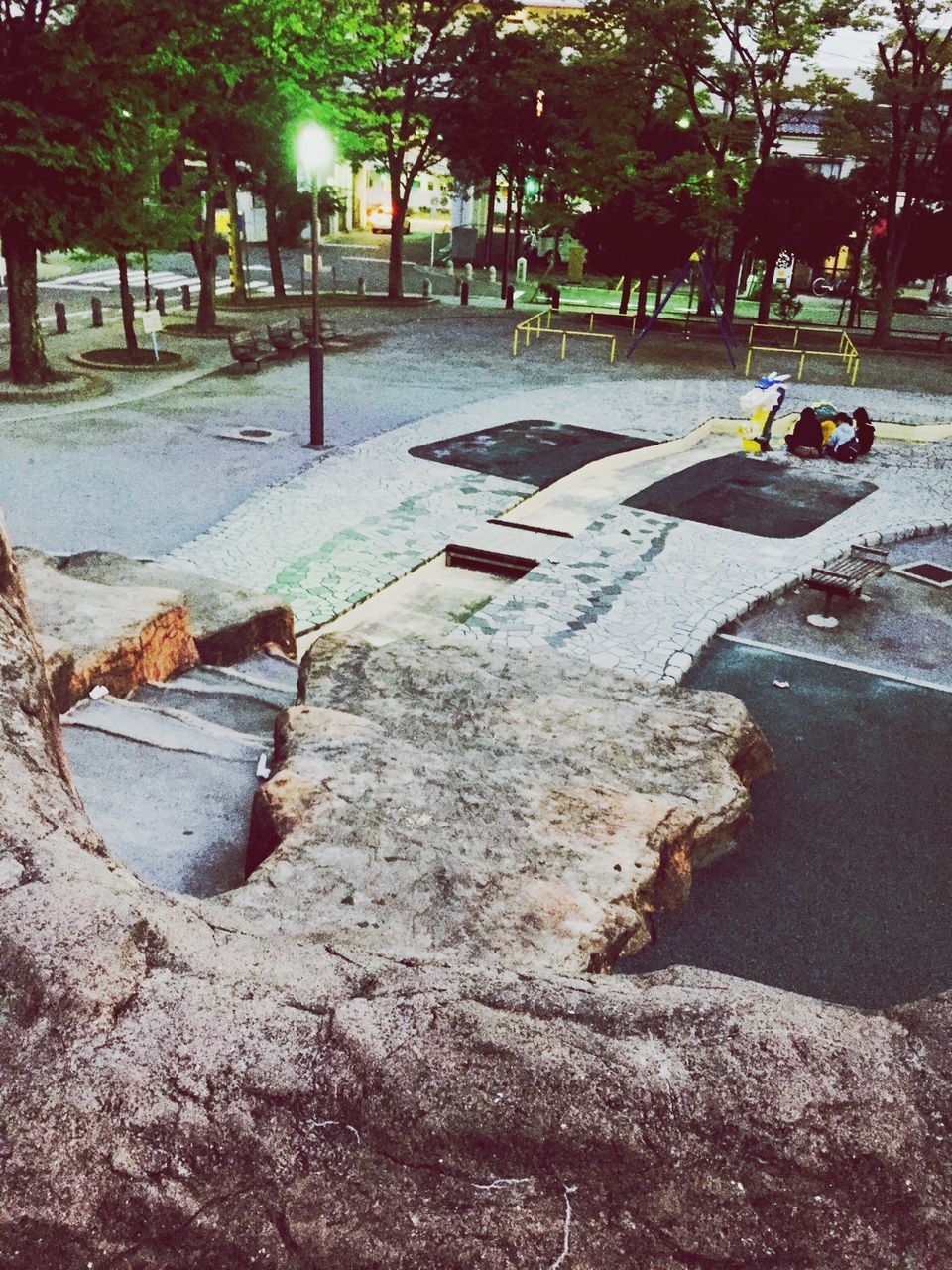 tree, tranquility, sunlight, nature, tree trunk, park - man made space, outdoors, shadow, footpath, no people, tranquil scene, day, leaf, street, season, absence, road, bench, forest, empty