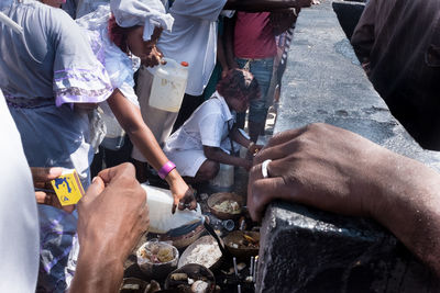 High angle view of people standing on street