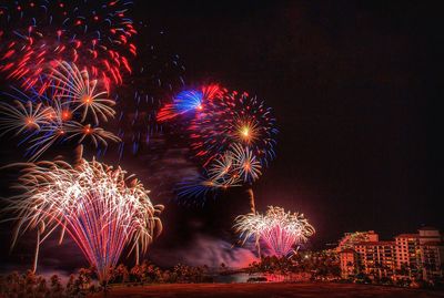 Firework display at night