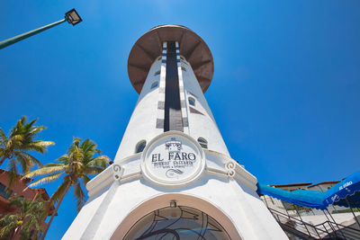 Low angle view of traditional building against clear blue sky