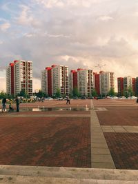 Buildings in city against sky