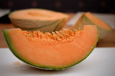 Close-up of orange slices on table