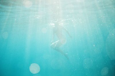 Man swimming in sea