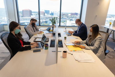 Group of people working on table