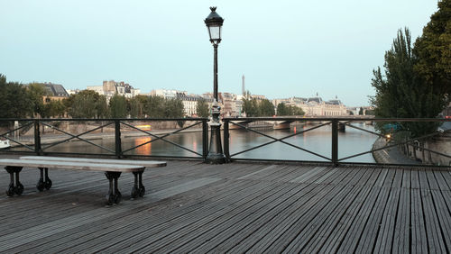 View of bridge over river in city