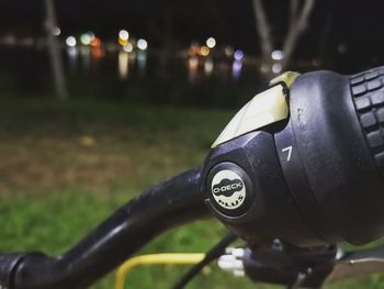 Close-up of bicycle on field