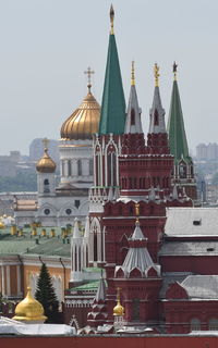 View of temple against buildings