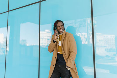 Young man looking at camera