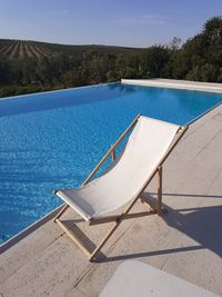 View of swimming pool against blue sky