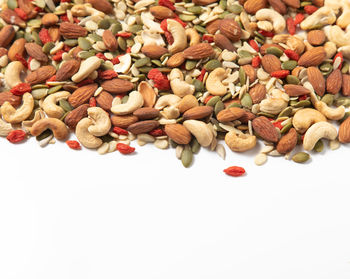 High angle view of candies against white background