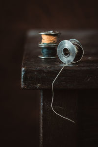 Close-up of old machine on table