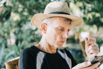 Portrait of man wearing hat