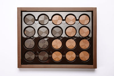 Close-up of coins on white background