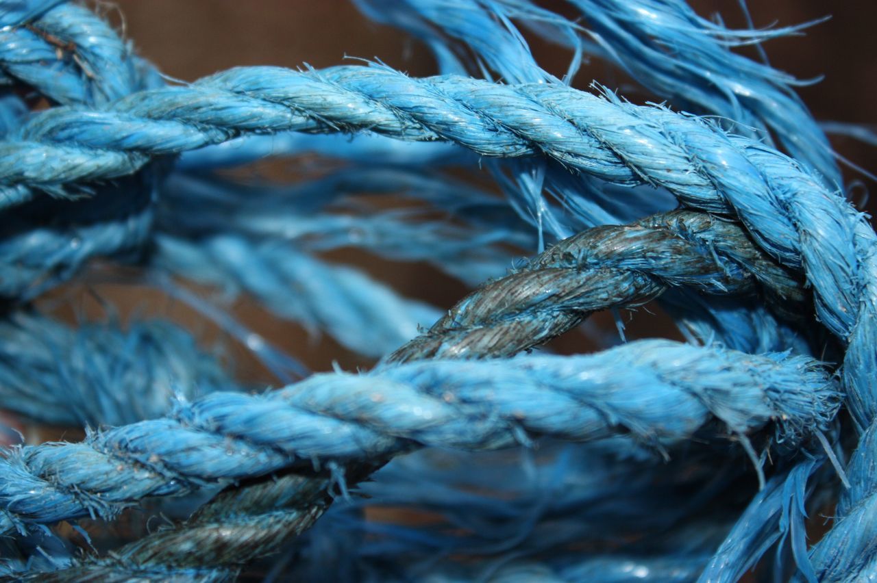 rope, close-up, strength, no people, twisted, textured, tied knot, day, focus on foreground, pattern, backgrounds, connection, tied up, string, blue, fiber, still life, full frame, durability, tangled, complexity