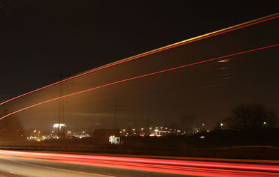 Light trails on road at night