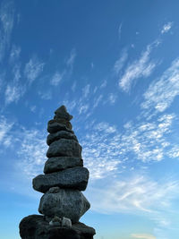 Low angle view of statue against sky