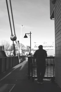 Woman standing on city street