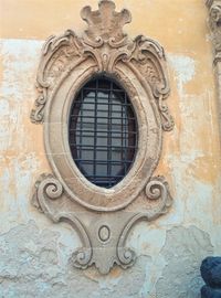 Low angle view of ornate window