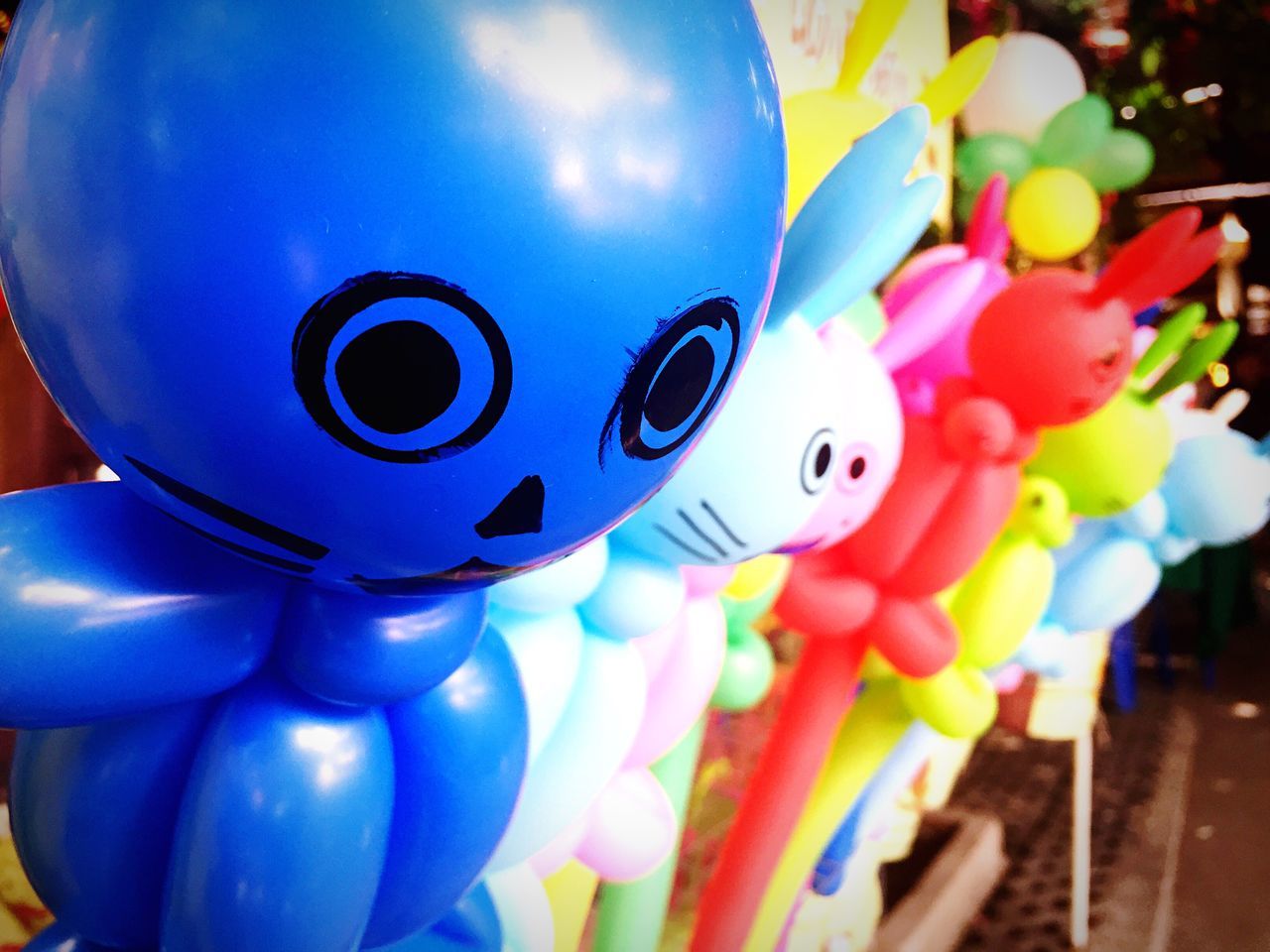 CLOSE-UP OF COLORFUL BALLOONS