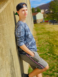 Portrait of boy standing outdoors