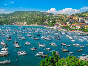 High angle view of harbor by sea against sky