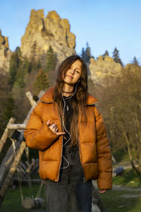 Portrait of a girl in a warm red jacket.