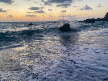 Scenic view of sea against sky during sunset