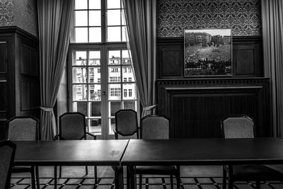 Chairs and table in room - rathaus 