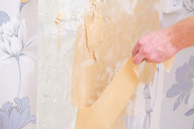 Cropped hand of person washing hands