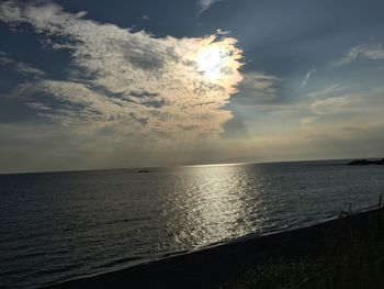 Scenic view of sea against sky at sunset