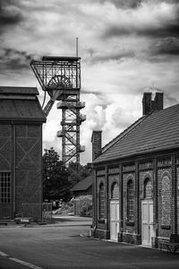 Low angle view of old industrial  building against cloudy sky, lwl-industriemuseum zeche zollern