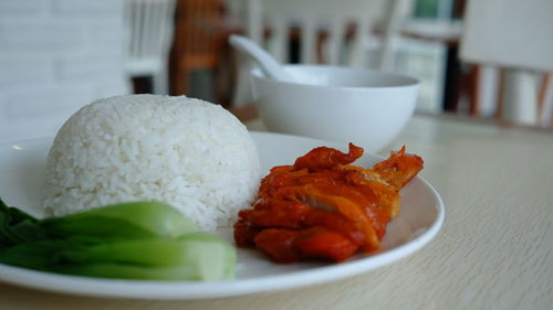 Close-up of food in plate on table