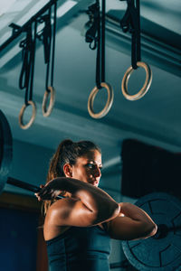 Woman exercising at gym 