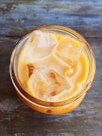 Close-up of thai tea served on table