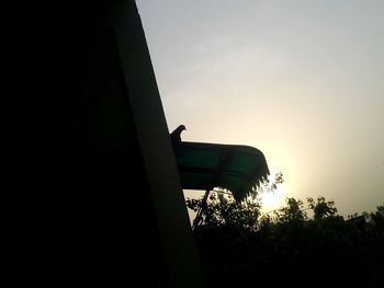 Low angle view of water tower against sky