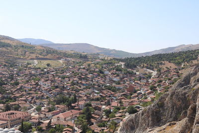 Aerial view of townscape against clear sky