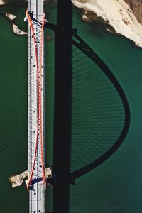 High angle view of ferris wheel by river