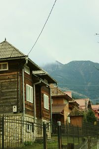 Houses and buildings against sky
