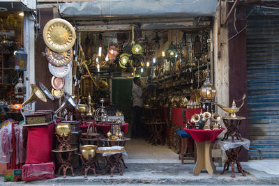 Chairs and tables at market stall