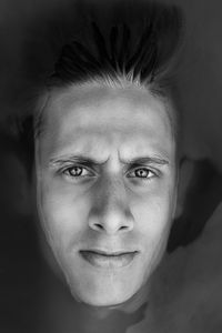 Close-up portrait of smiling mid adult man