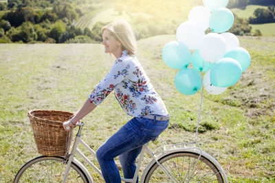 Side view of man with bicycle