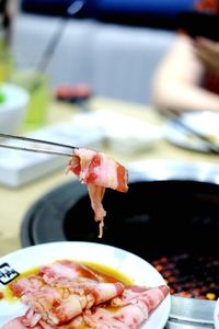 Close-up of meat on barbecue grill