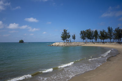 Scenic view of jerudong beach located at brunei darussalam against sky. 