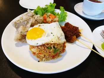 Close-up of breakfast served on table