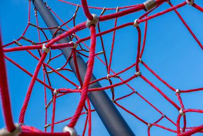 Low angle view of metallic structure against sky